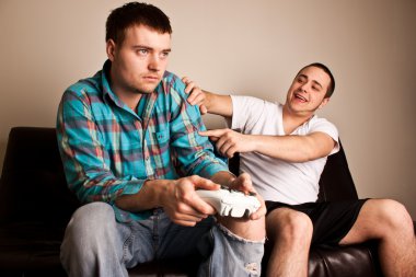 Two Guys Playing VG Shove clipart