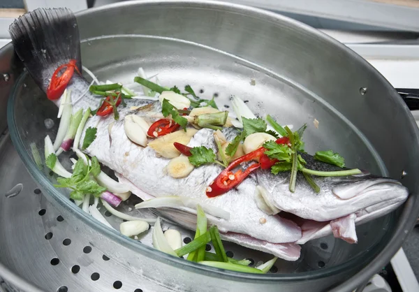 Steamed seabass in oriental sauce — Stock Photo, Image