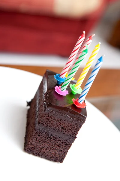 stock image Delicious chocolate fudge cake with candles