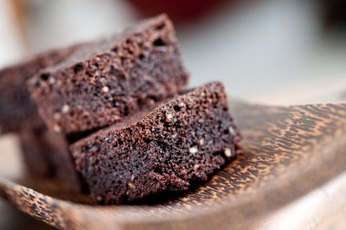 Plate of delicious sliced chocolate brownies. clipart