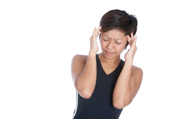 Sportovní žena trpící silné bolesti hlavy a migréna — Stock fotografie