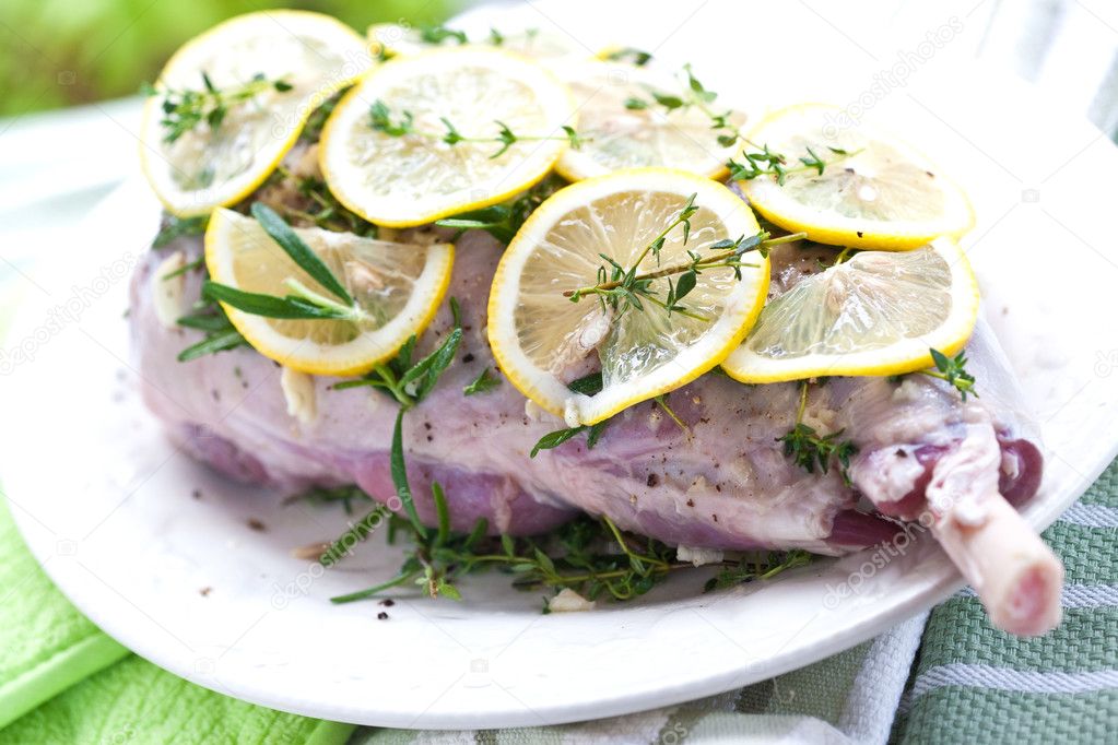 Leg of lamb with rosemary, garlic and lemon ready for the oven