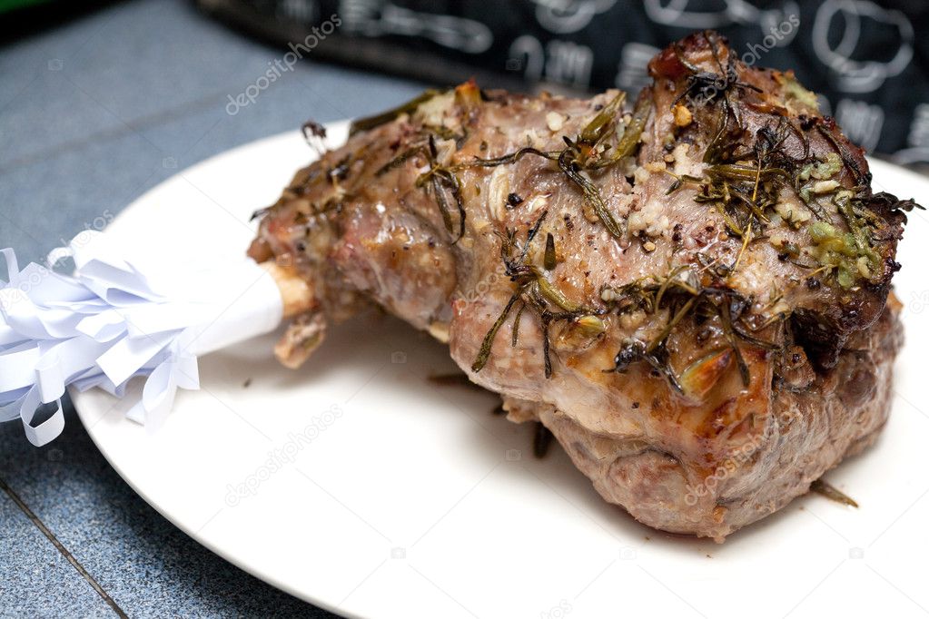Juicy roasted leg of lamb with rosemary and garlic