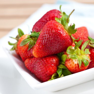 Fresh ripened and juicy strawberries. clipart