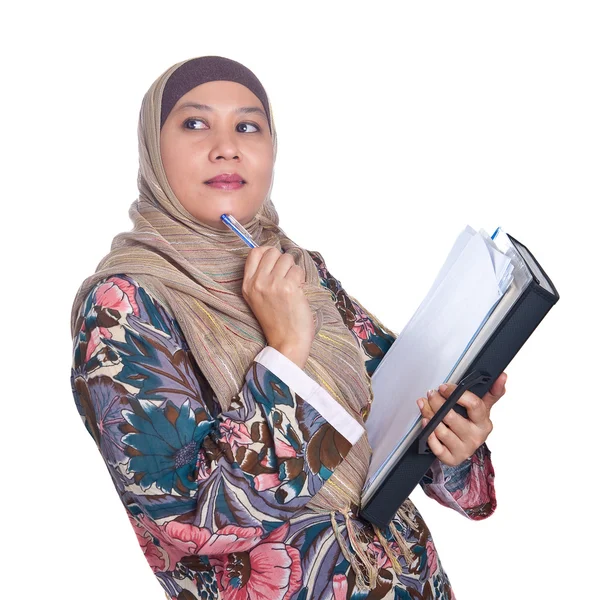 Beautiful mature Muslim woman in thinking pose — Stock Photo, Image