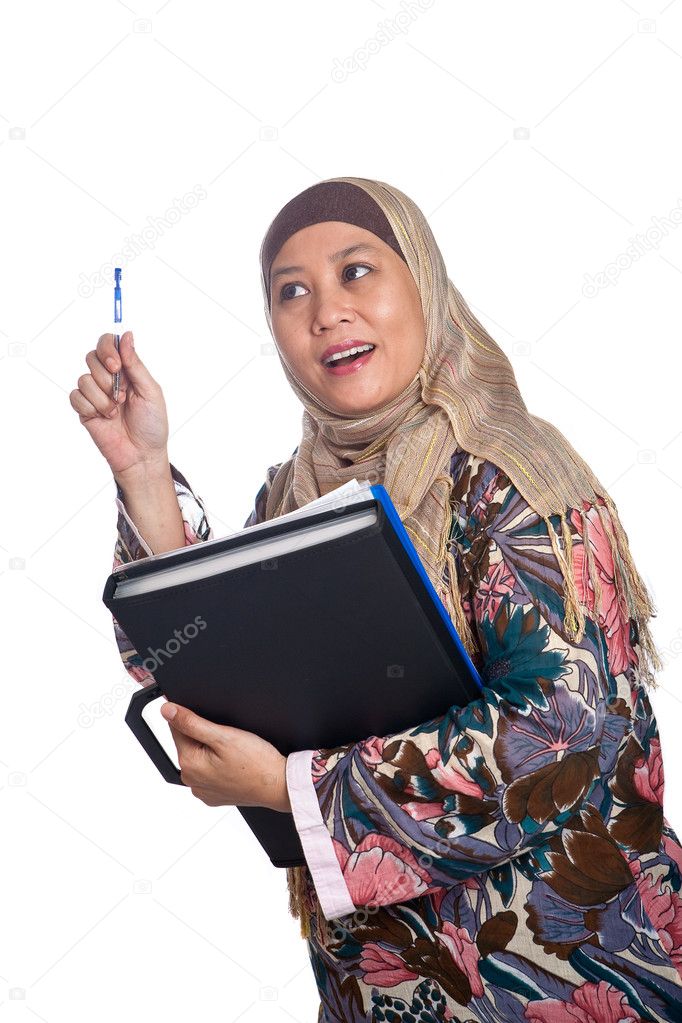 Beautiful mature Muslim woman in thinking pose