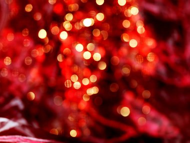 Altın christmas dekorasyon kırmızı bokeh arka plan üzerinde