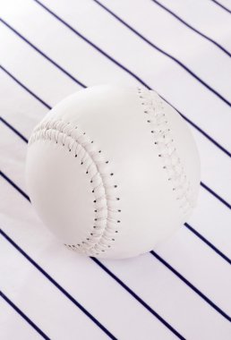 Softball on pinstripe background clipart