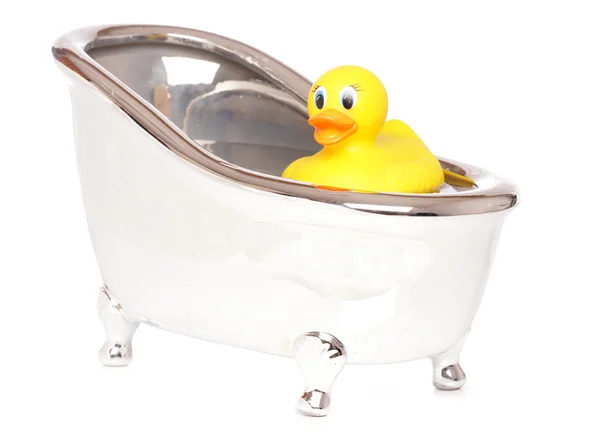 Canard jaune en caoutchouc dans un bain — Photo