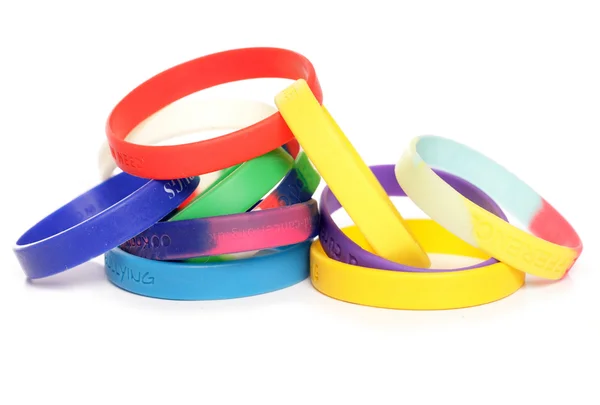 Various charity fundraising wristbands — Stock Photo, Image