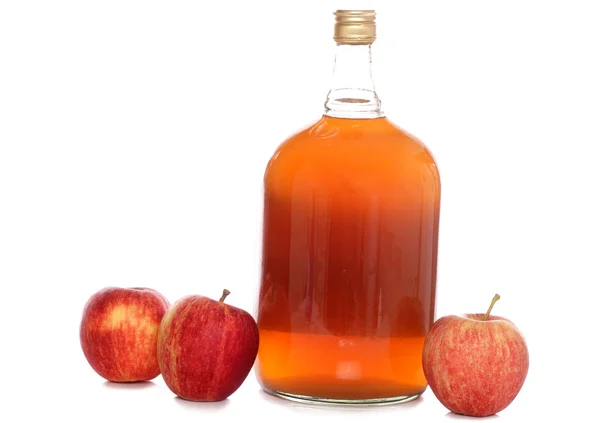 stock image Bottle of cider with apples