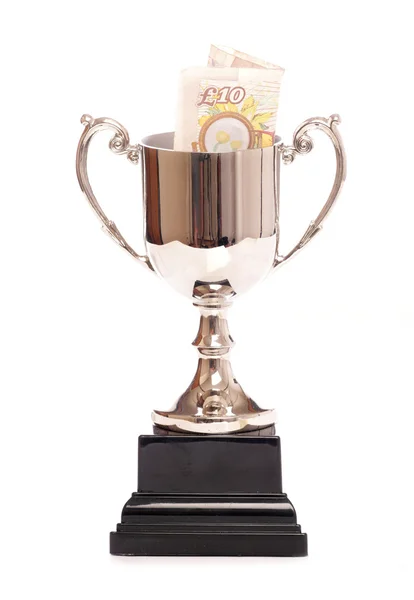 Silver trophy with ten pound note — Stock Photo, Image