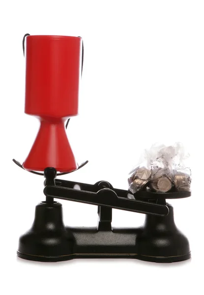 Charity collection on scales with sterling money — Stock Photo, Image