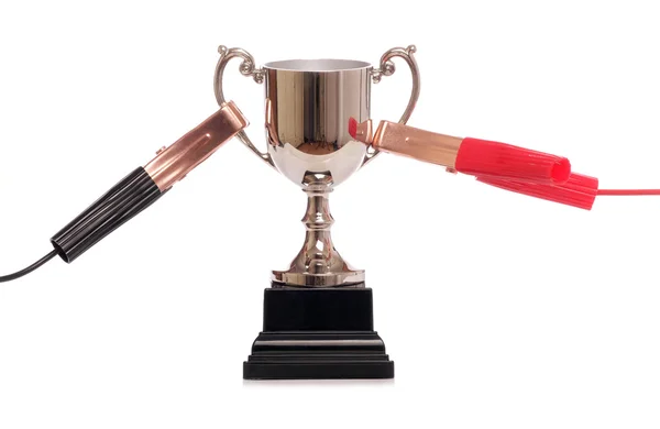 Trophy and battery charger — Stock Photo, Image