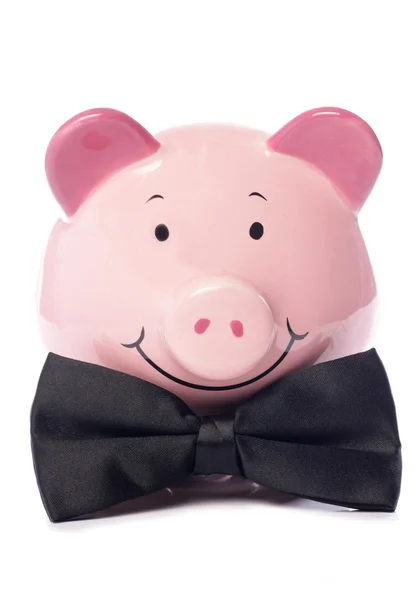 Piggy banco com laço preto — Fotografia de Stock