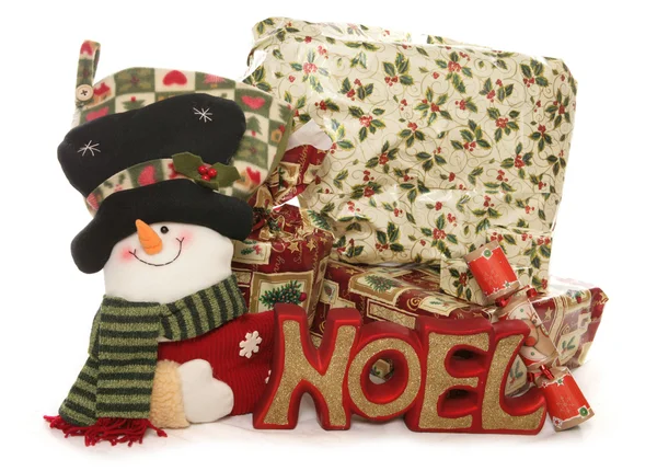 Christmas presents and stocking studio cutout — Stock Photo, Image