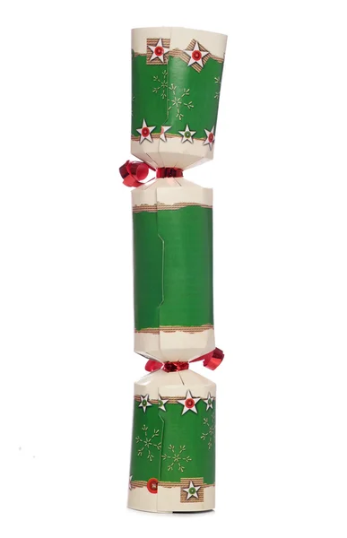 Зеленый рождественский крекер — стоковое фото