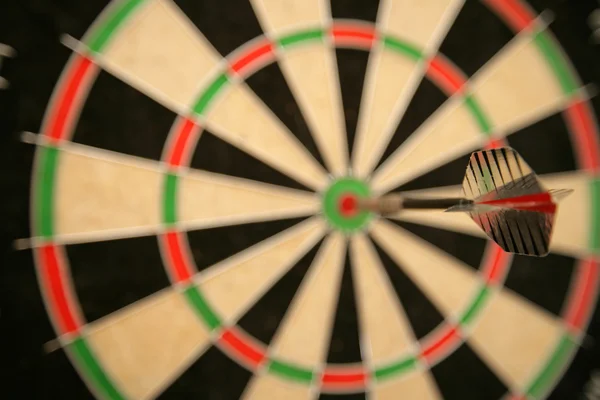 Darts in bullseye — Stock Photo, Image