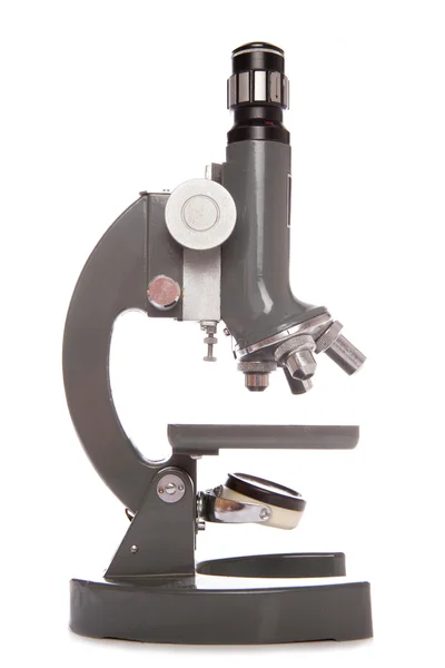 Naukowym mikroskopem na białym tle — Zdjęcie stockowe