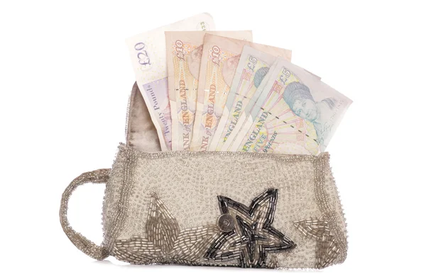 Женский кошелек со стерлинговыми деньгами — стоковое фото