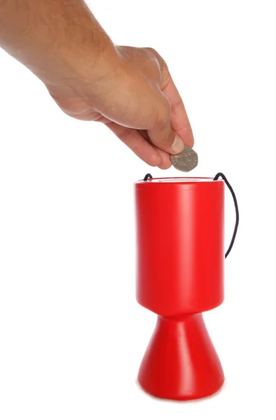 Man donera 50 pence till välgörenhet — Stockfoto