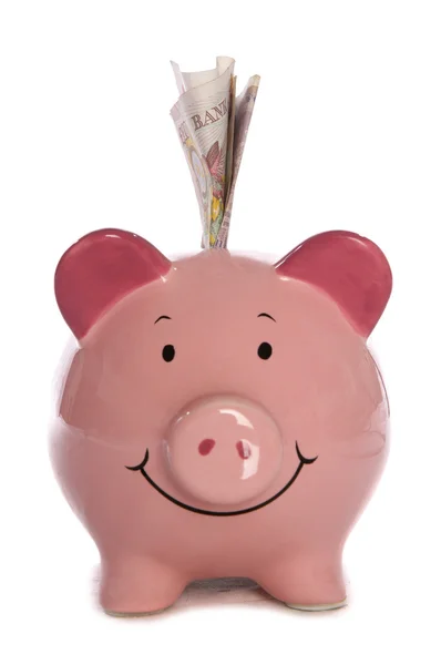 Piggybank com dez libras esterlinas — Fotografia de Stock