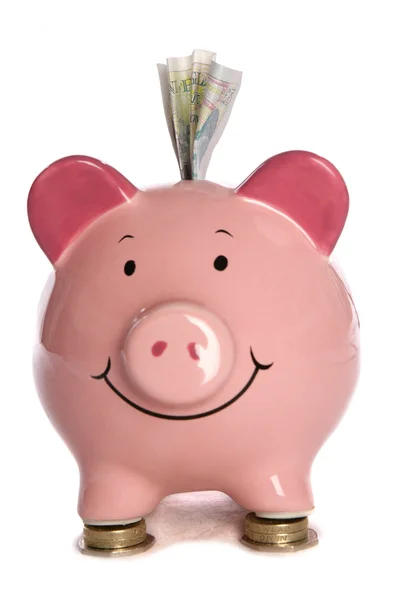 Sparschwein mit fünf Pfund Sterling — Stockfoto