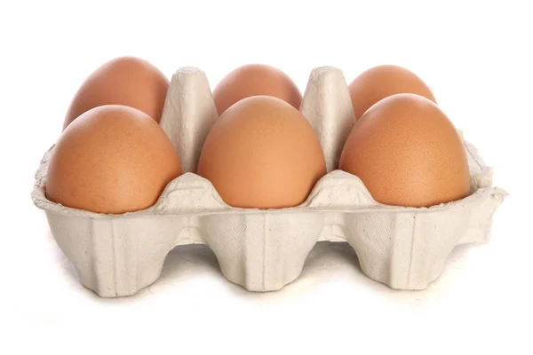 Media docena de huevos frescos recortados — Foto de Stock