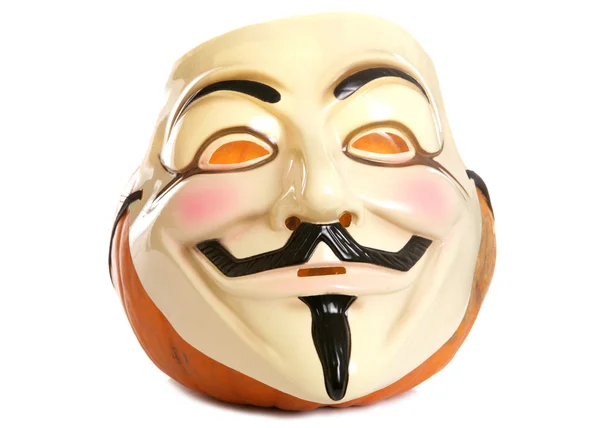 Pumpkin and guy fawkes mask — Stock Photo, Image
