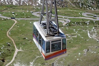 Cable car that comes on top of the mountain in Val di Fassa Pordoi Sass clipart