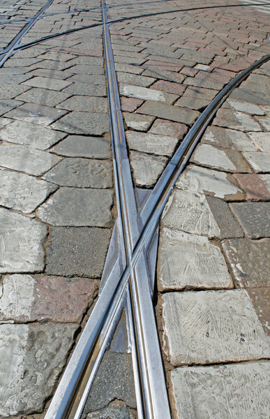 Shimmering tramway on marble flooring in Italy