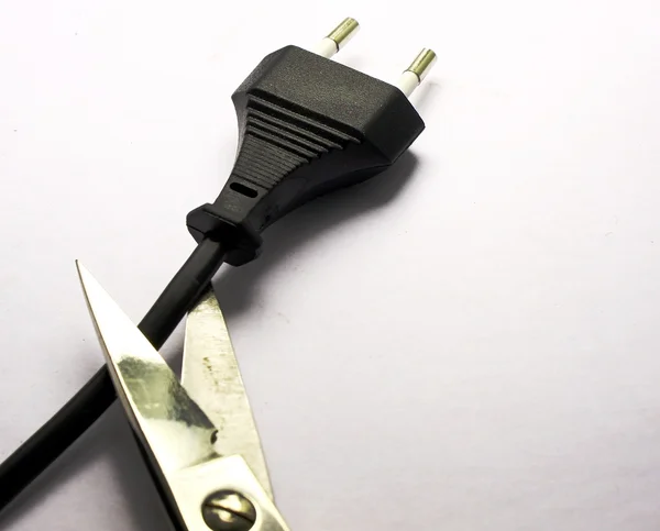 Plug cut with scissors — Stock Photo, Image