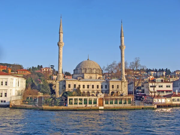 stock image Turkish mosque reflects on the water of the Bosphorus