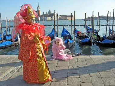 Colorful carnival mask on display in Venice clipart