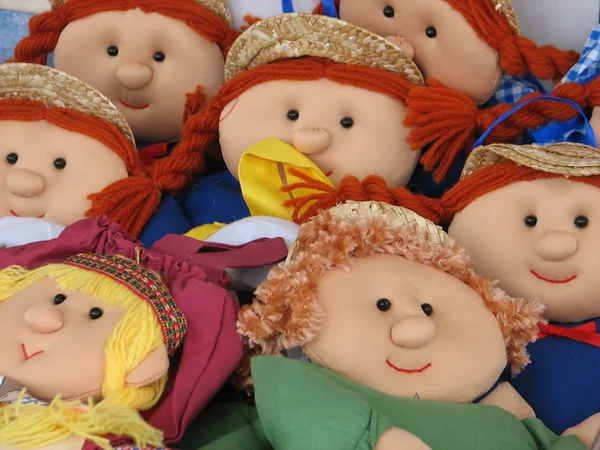 Faces of handmade rag dolls for sale at market — Stock Photo, Image