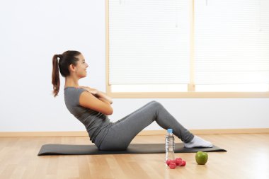 Girl doing sport exercises clipart