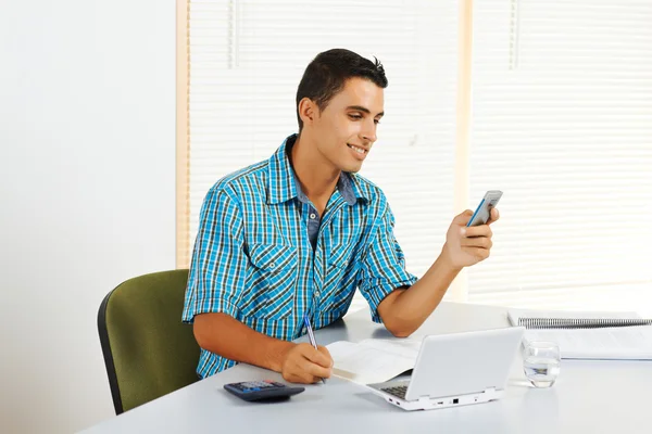 Young man receiving a call — Stock Photo, Image