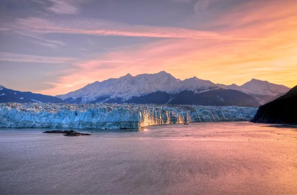 日の出・ ハバード氷河 ロイヤリティフリーのストック画像