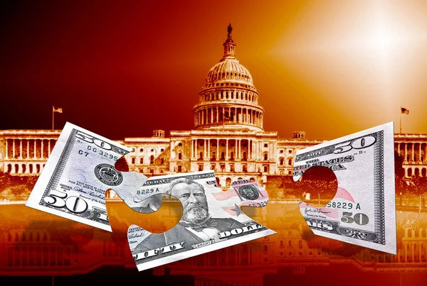 Femtio dollar pussel på capitol bakgrund — Stockfoto