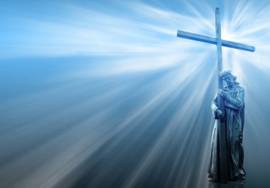 Jesus holding a cross on blue background clipart