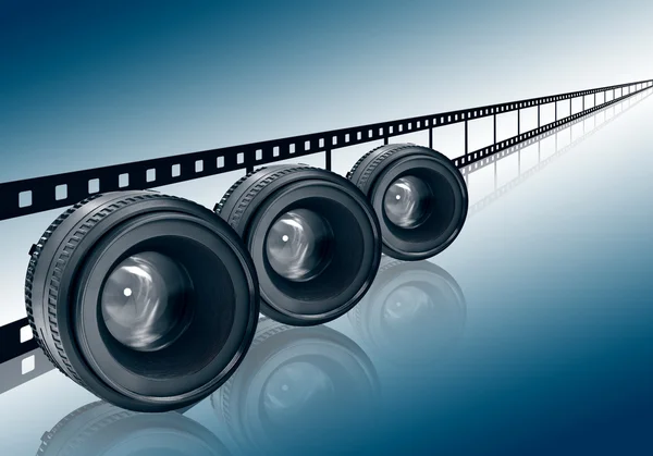 Linse & Filmstreifen auf blauem Hintergrund lizenzfreie Stockbilder