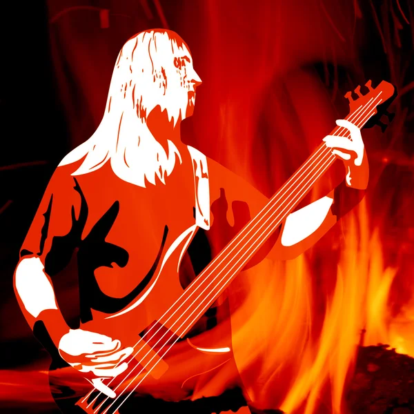 Guitarist silhouette on burning background — Stock Photo, Image