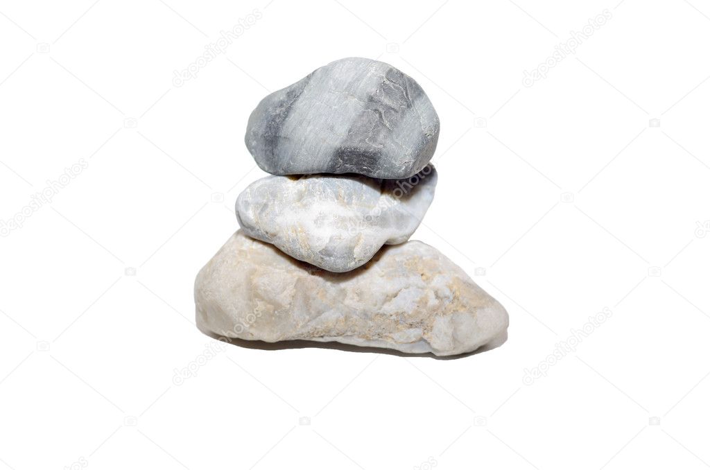 Balanced Zen stones on white