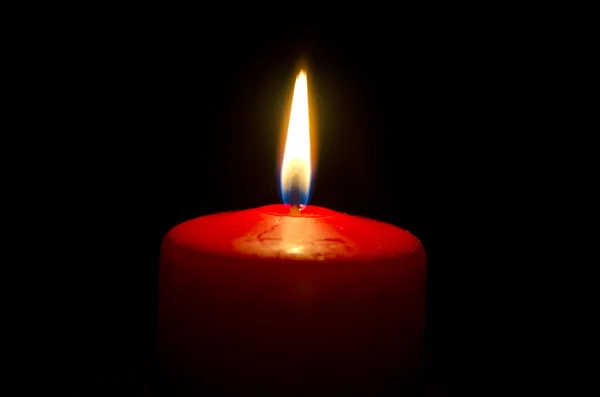 Burning red candle — Stock Photo, Image