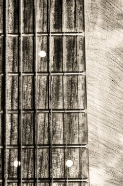 Guitar neck fingerboard on textured background clipart