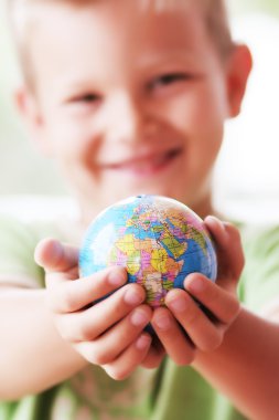 The world in kids hands clipart