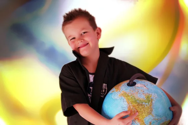 Boy with globe — Stock Photo, Image