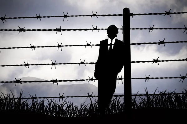 Manager behind Barbed wire — Zdjęcie stockowe