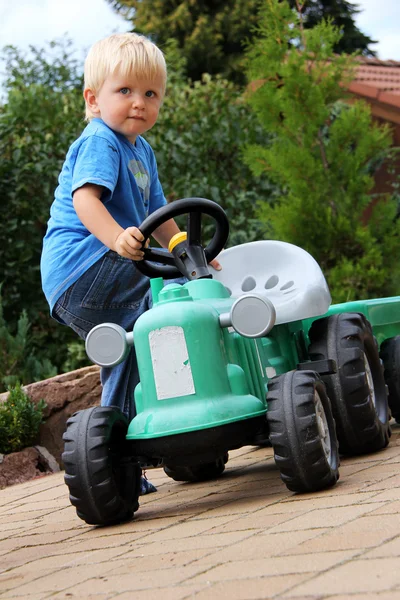 stock image Little boy with tractor