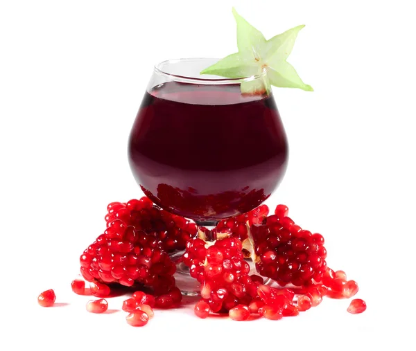 Pomegranate juice and carambola — Stock Photo, Image